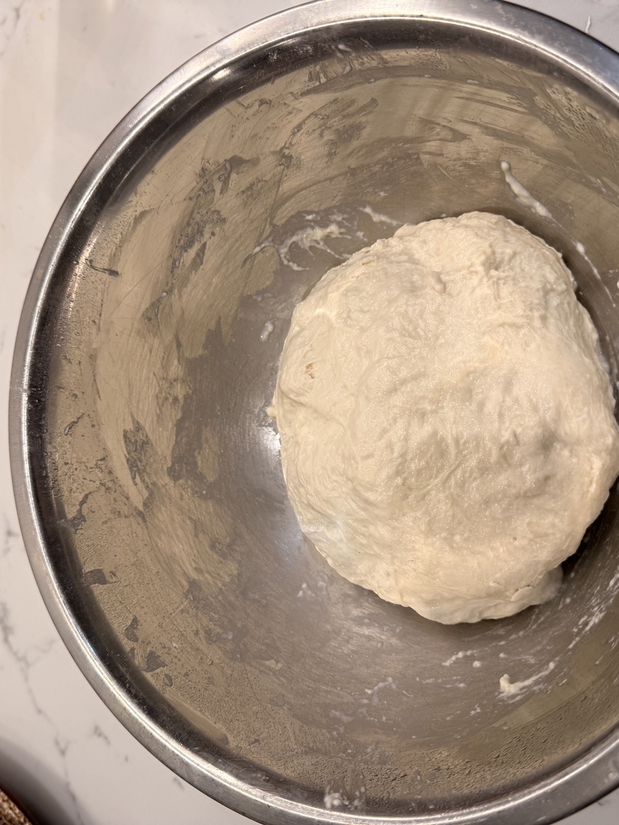 Dough after first stretch and fold showing early gluten development