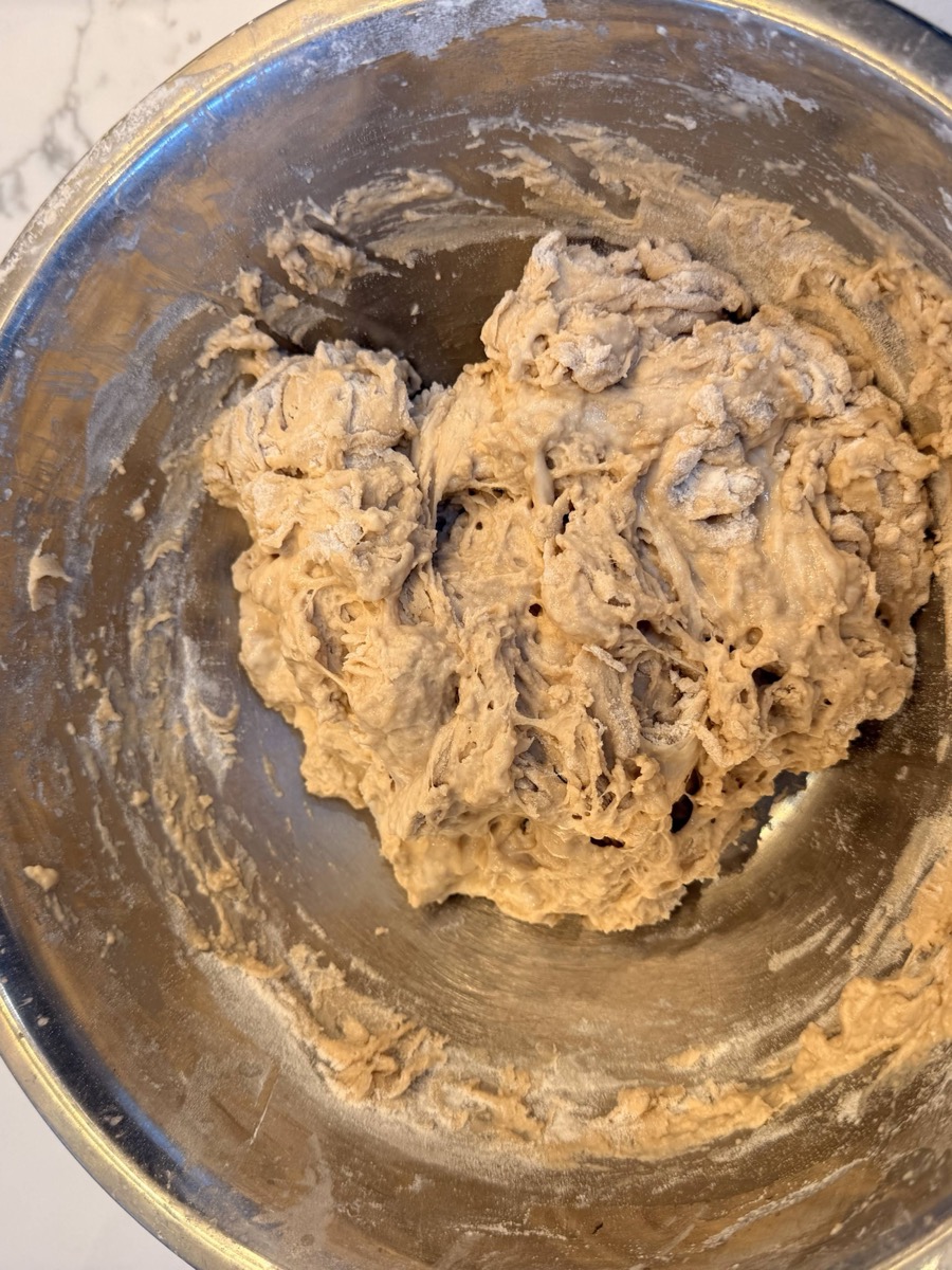 Guinness sourdough dough after initial mixing, showing a slightly darker tan colour compared to a standard sourdough